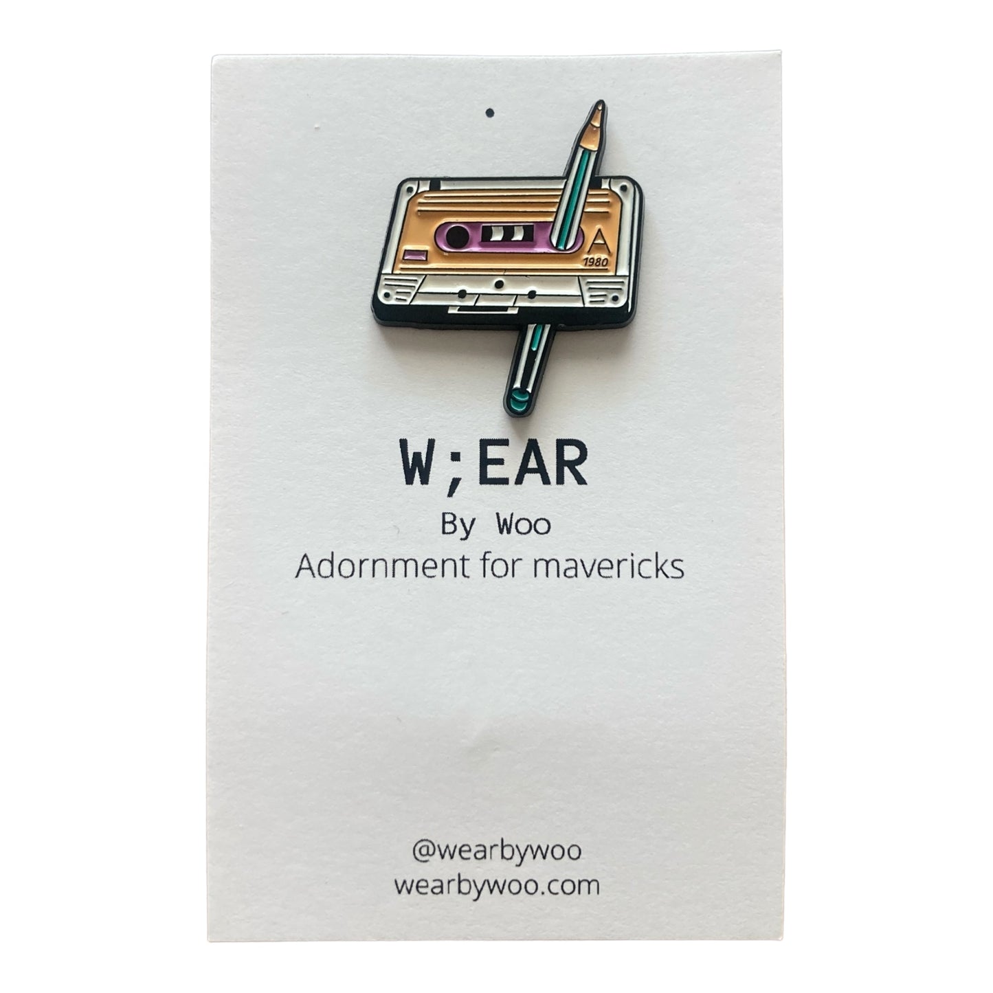Cassette pencil badge