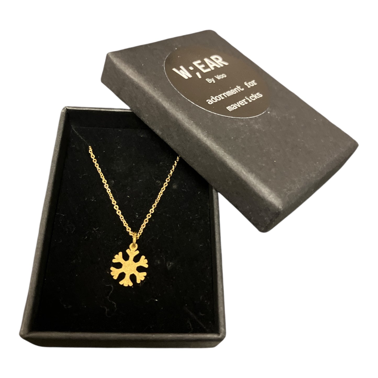 Small brass snowflake necklace