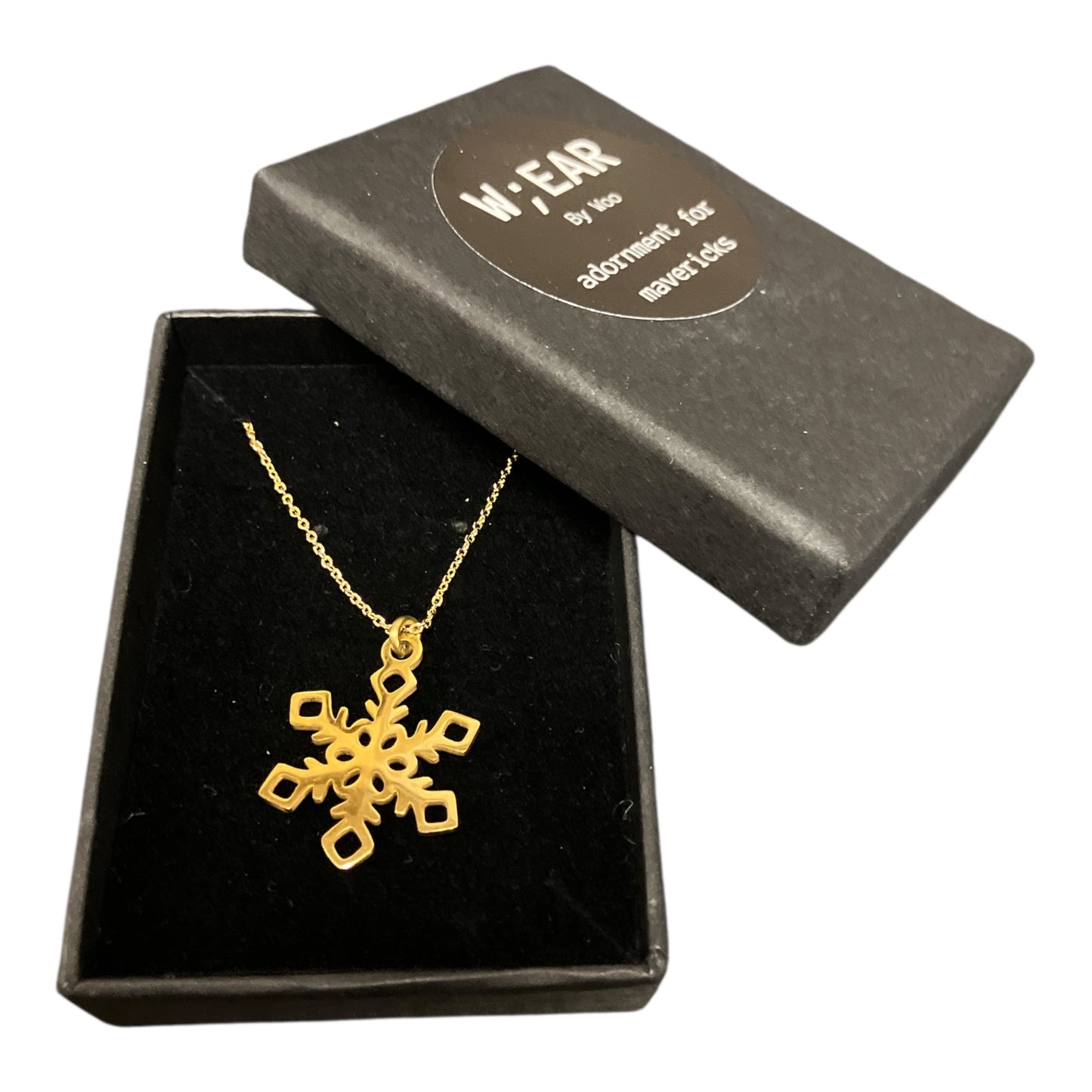 Medium brass snowflake necklace